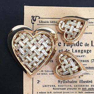 Trifari A philippe heart pave brooch and earrings Trifari 1951